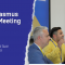 The visual shows on the left the title: "GaragErasmus Annual Meeting 2026" and subtitle: Napoli, Università Suor Orsola Benincasa. On the right side there is a picture of four speakers 